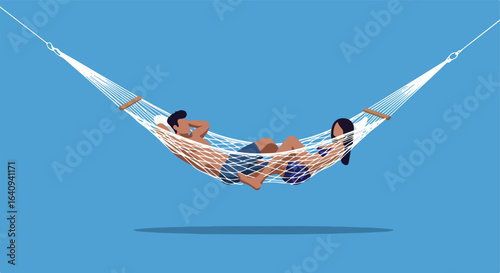 Couple relaxes together on white hammock on vacation. They are lying and resting