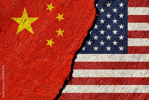 china and usa flags painted on cracked concrete wall