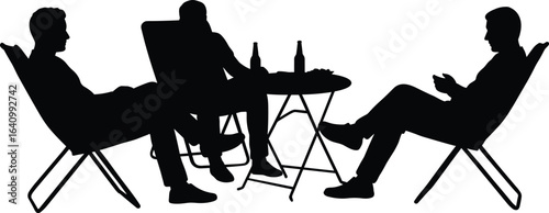 Silhouette of three men relaxing on outdoor chairs, drinking beer, socializing around table, leisure time, casual evening gathering