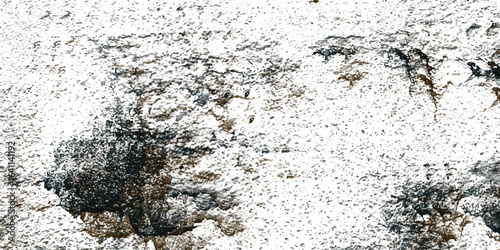 Abstract textured surface displaying a granular pixelated aesthetic with variations of light and dark tones and a rough appearance