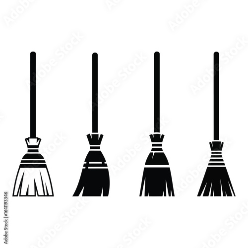 Vector art of four witch brooms isolated on white background