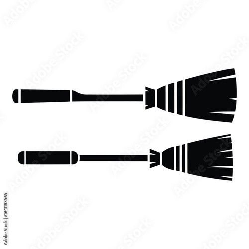 Vector art of two witch brooms isolated on white background