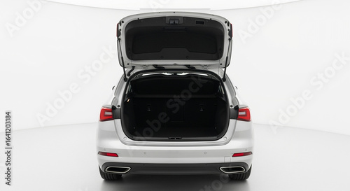 White car open trunk hatchback vehicle auto automobile automotive transport luggage space rear view