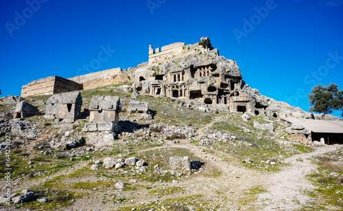 Tlos was an ancient Lycian city near the modern town of Seydikemer in the Mugla Province of southern Turkey, some 4 kilometres northwest of Saklikent Gorge. Tlos ancient city and amphitheatre Fethiye