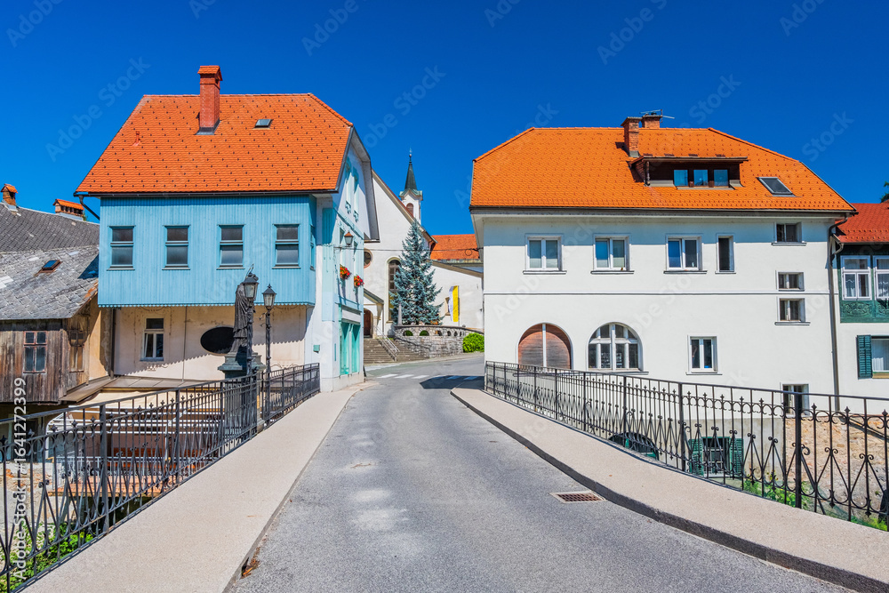 Obraz premium Capuchin's Bridge or Stone Bridge in Skofja Loka Slovenia. Originally built in the 14th century.