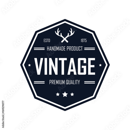 This vintage-inspired logo design showcases a hexagonal shape with antlers and bold typography emphasizing handmade products. It represents premium quality and adds a distinctive touch to branding.