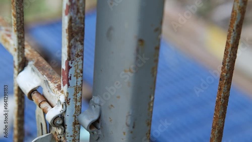 Old, rotten, rusted dog cage, rusty cage door latch, 3 video clips