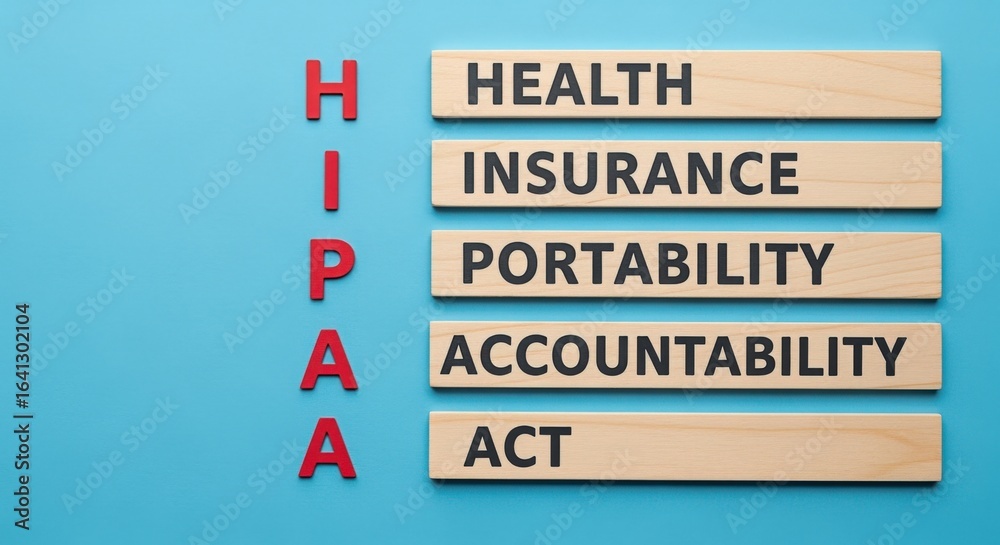 Obraz premium Health Insurance Portability and Accountability Act Acronym, High Angle Flat Lay on Blue Background