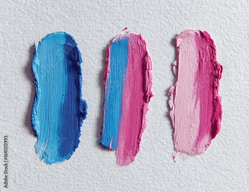 Blue, pink, cosmetic swatches on white, studio