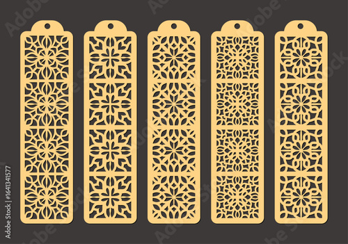 Set of five ornate golden lasercut bookmarks with intricate geometric patterns and a hole at the top for hanging vector