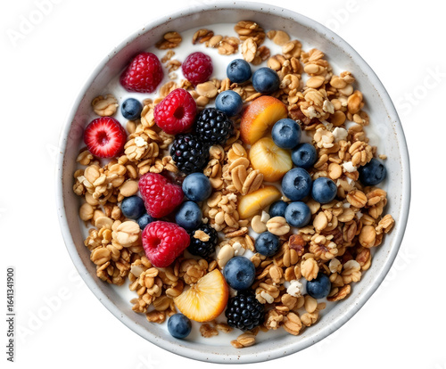 Close up white granola bowl cooked full of nuts, grain and mix berries fruit and milk premium homemade dish