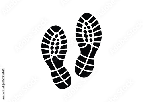 Pair of running shoe prints silhouette black vector white background