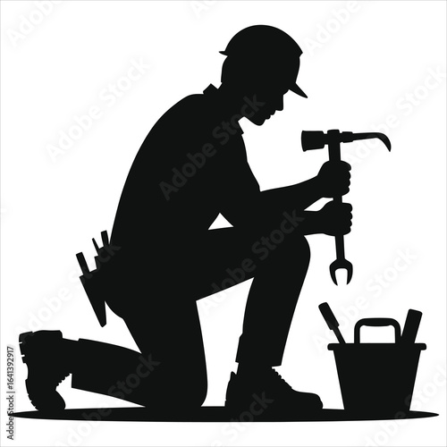 Silhouette of construction worker kneeling with tools and hard hat, repairing equipment with wrench and hammer, industrial labor concept, skilled tradesman at work, black isolated vector illustration