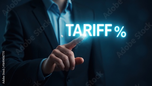 Businessman pointing to glowing tariff text and percent icon, highlighting tariff increase and import tax in economic analysis