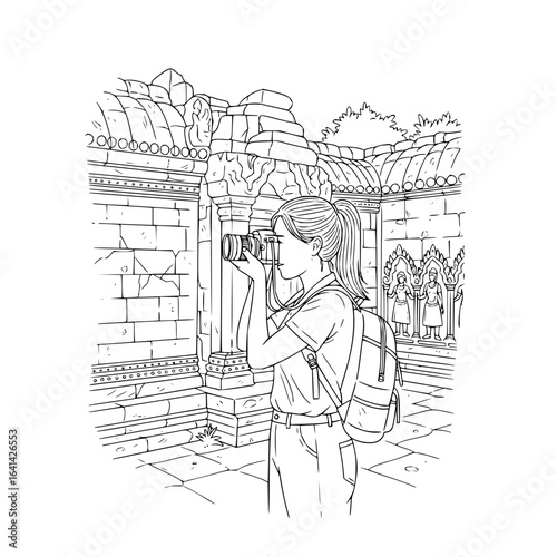 Woman with backpack taking a photo of ancient ruins with carvings and stone architecture in black and white