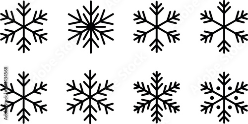 Collection of eight intricate black and white snowflake illustrations displayed against a clean white background