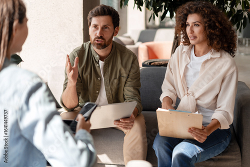 Marketing team discussing new project during informal meeting