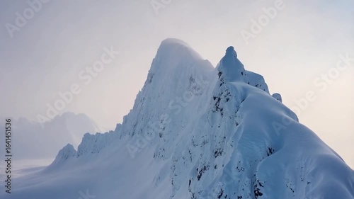 Majestic Winter Mountain Peak in the Mist