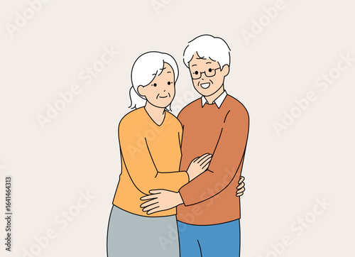 A Happy Senior Couple is Embracing in a Joyful Moment Filled with Love and Affection