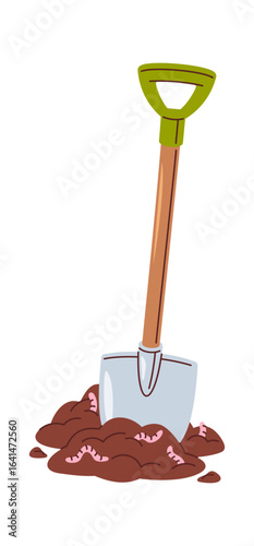 Shovel garden tool in compost