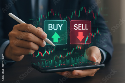 Stock market trading concept with buy and sell options on digital screen held by businessman