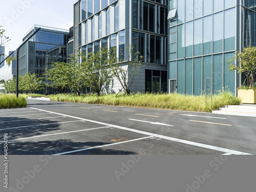 Wallpaper Mural enpty asphalt road with modern office building Torontodigital.ca