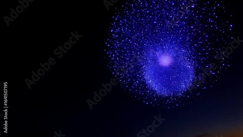Stunning Blue Fireworks Display at Night