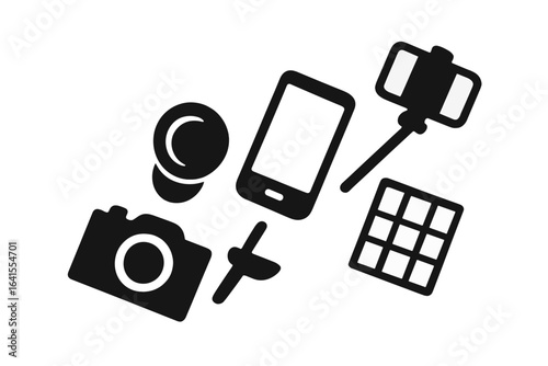 Photography equipment and accessories arranged on a flat surface for creative projects and mobile capturing in a modern setting
