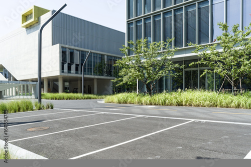 Wallpaper Mural enpty asphalt road with modern office building Torontodigital.ca
