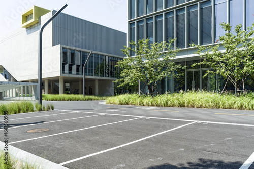 Wallpaper Mural enpty asphalt road with modern office building Torontodigital.ca