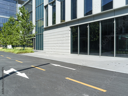 Wallpaper Mural enpty asphalt road with modern office building Torontodigital.ca