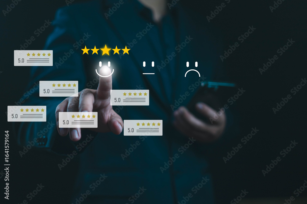 Obraz premium Customer satisfaction survey concept. User give five-star rating to service experience, A man presses phone in front of him,Good service has resulted in 5-star, satisfaction, user, Positive Review