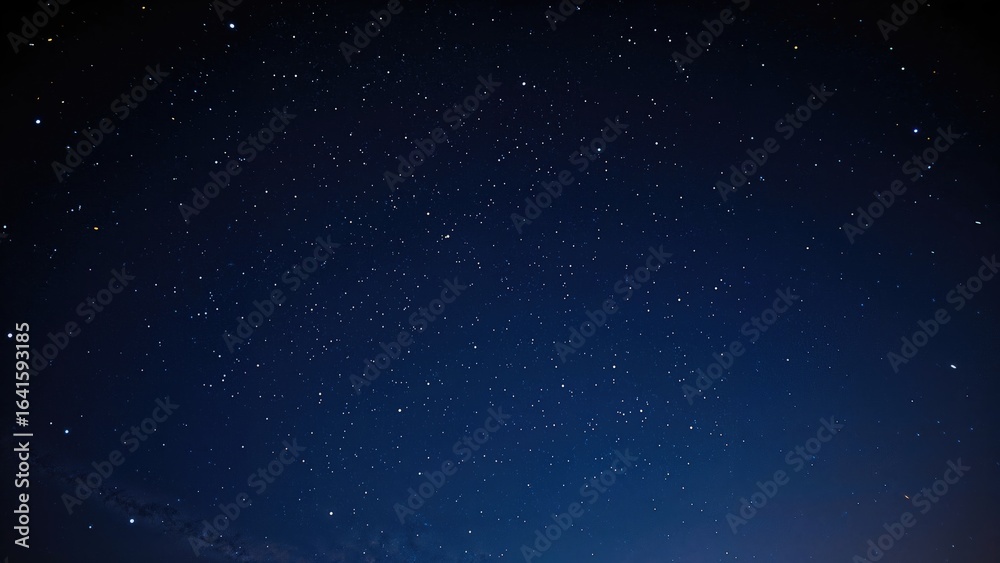Obraz premium Expansive view of a star-filled dark blue night sky