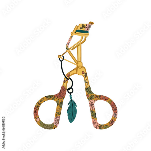 Eyelash curler tool with patterned handles and a small leaf charm.