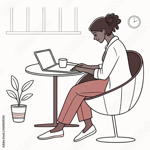 Focused woman with dark skin working on a laptop in a modern chair with a plant and clock