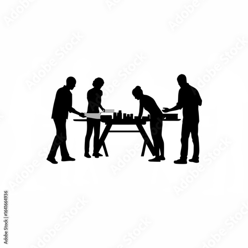 Young architects collaborating around a table silhouette isolated on white background