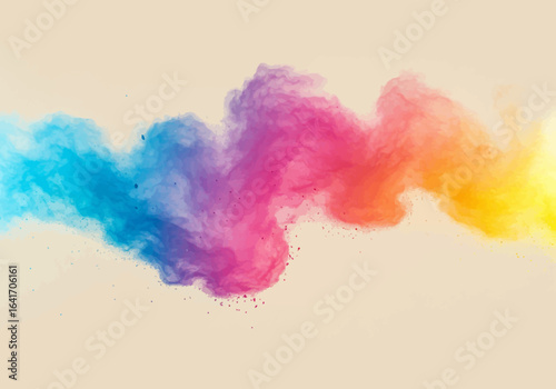 Vibrant explosion of colorful powder paint erupts across a clean beige backdrop creating a dynamic burst of creativity and energy perfect for artistic concepts