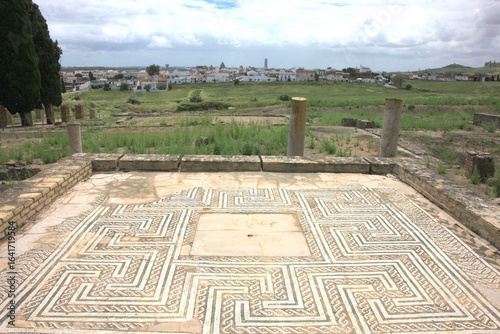 The Roman ruins of Italica. Italica, near Seville, Spain, was an ancient Roman city.  The Roman ruins of Italica feature remarkable mosaics and an impressive amphitheatre.