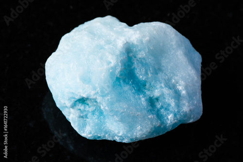 sample of raw blue aragonite mineral on black