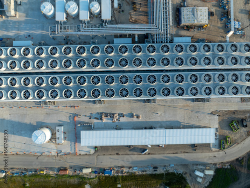 Chilling towers at an AI data center. A bank of cooling towers and infrastructure making sure a data center stays cool