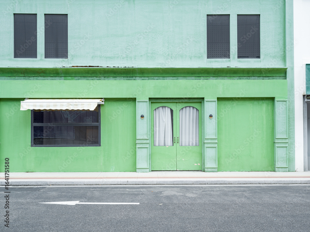 Fototapeta premium empty asphalt street with store