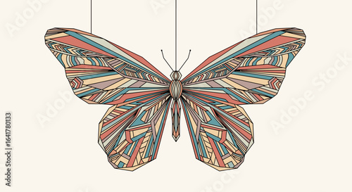 A beautifully patterned butterfly suspended in the air with delicate threads creating an enchanting visual spectacle