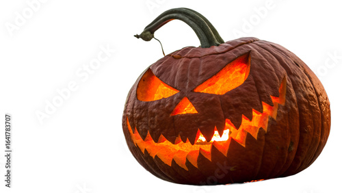 Scary carved halloween pumpkin jack o lantern glowing with a spooky face, isolated on transparent background