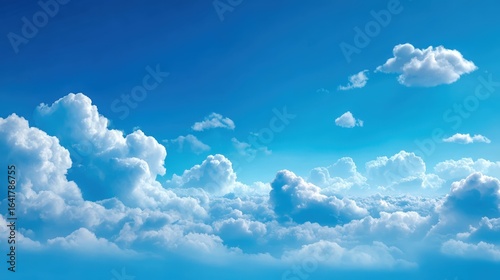 Scenic Aerial View of Fluffy White Clouds Against a Vibrant Blue Sky, Cloudscape Scenery