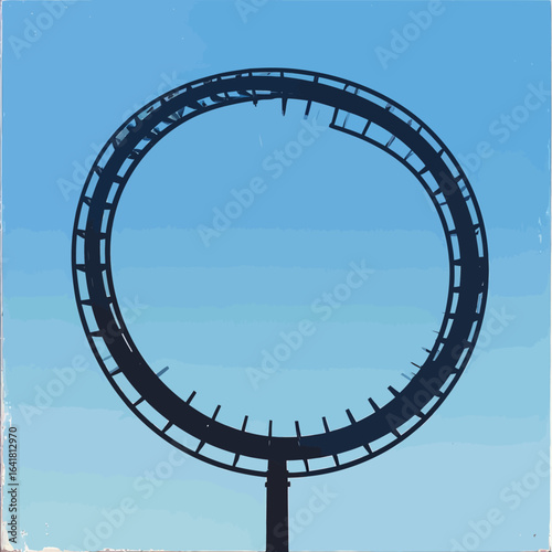Circular roller coaster against a clear blue sky