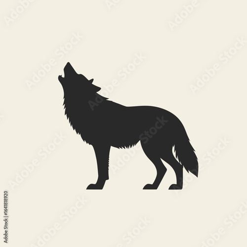 Silhouette of a howling wolf