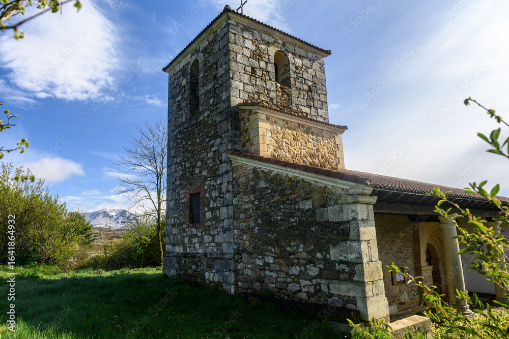 Naklejka premium Bell tower of San Adrian Martir church in Villalbeto Palencia