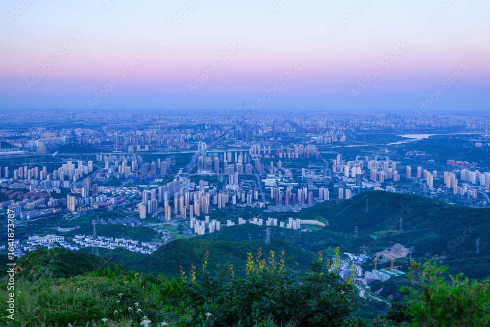 Obraz premium Overlooking Beijing cityscape and Venus Belt at night from Western Hills