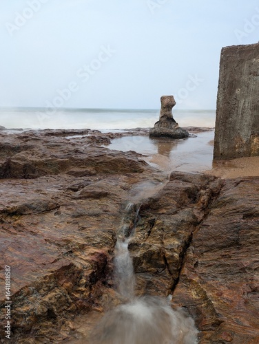An image of waves making patterns at one of the beaches in Vizag, i.e., Bheemili Beach, which is part of the coastline of the Bay of Bengal in the state of Andhra Pradesh in India.
