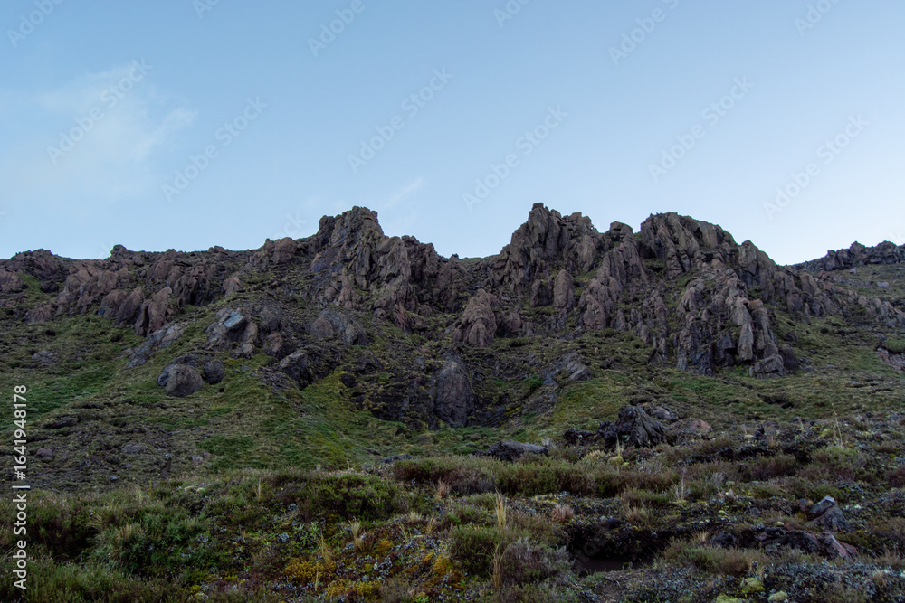 Rugged Mountain Landscape with Jagged Rock Formations Rugged Mountain Landscape with Jagged Rock Formations